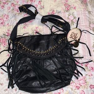 The Sak purse brand new black leather bag